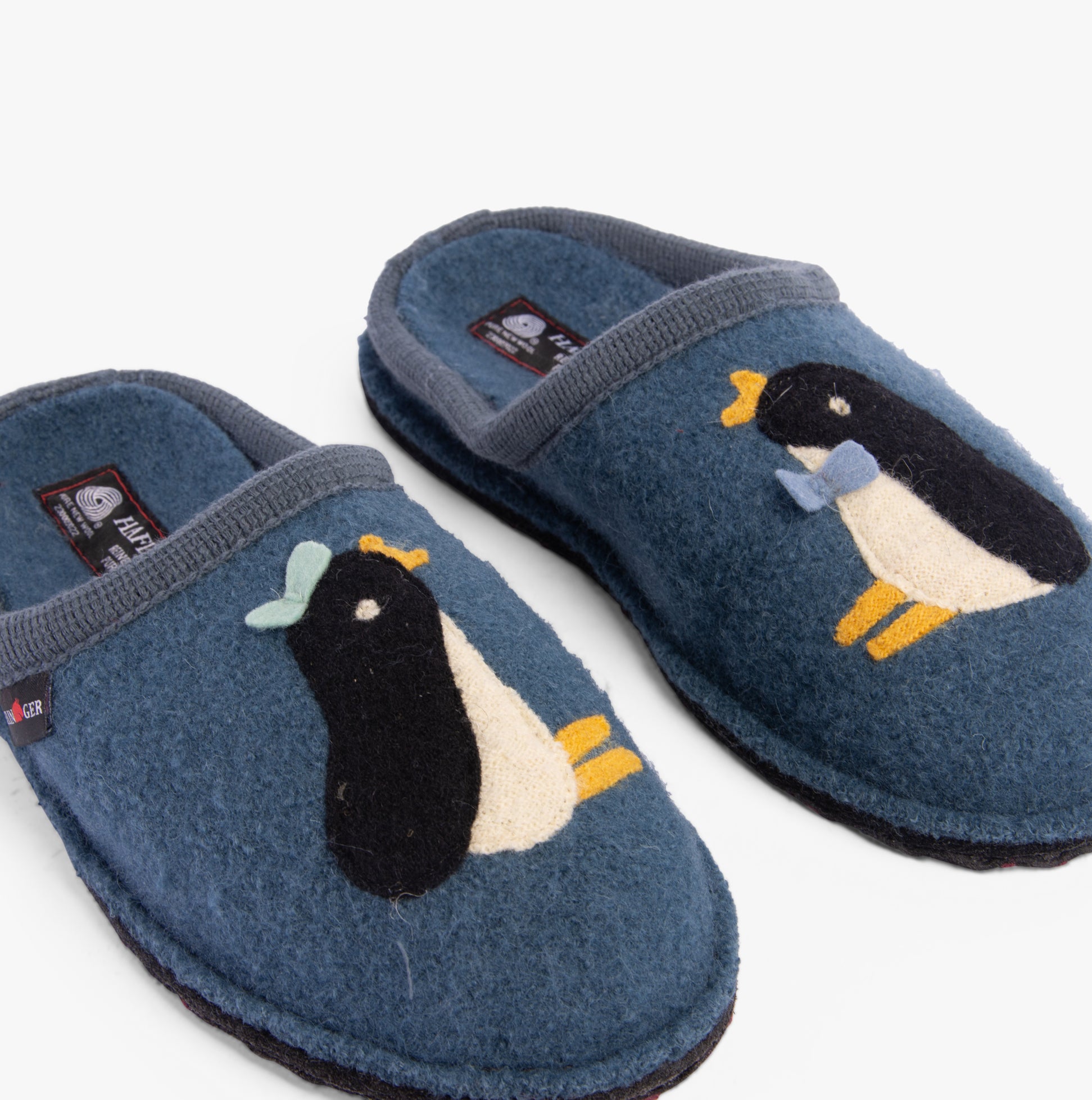 Haflinger PINGU Womens Slippers Powder Blue side view showing penguin design and wool texture.