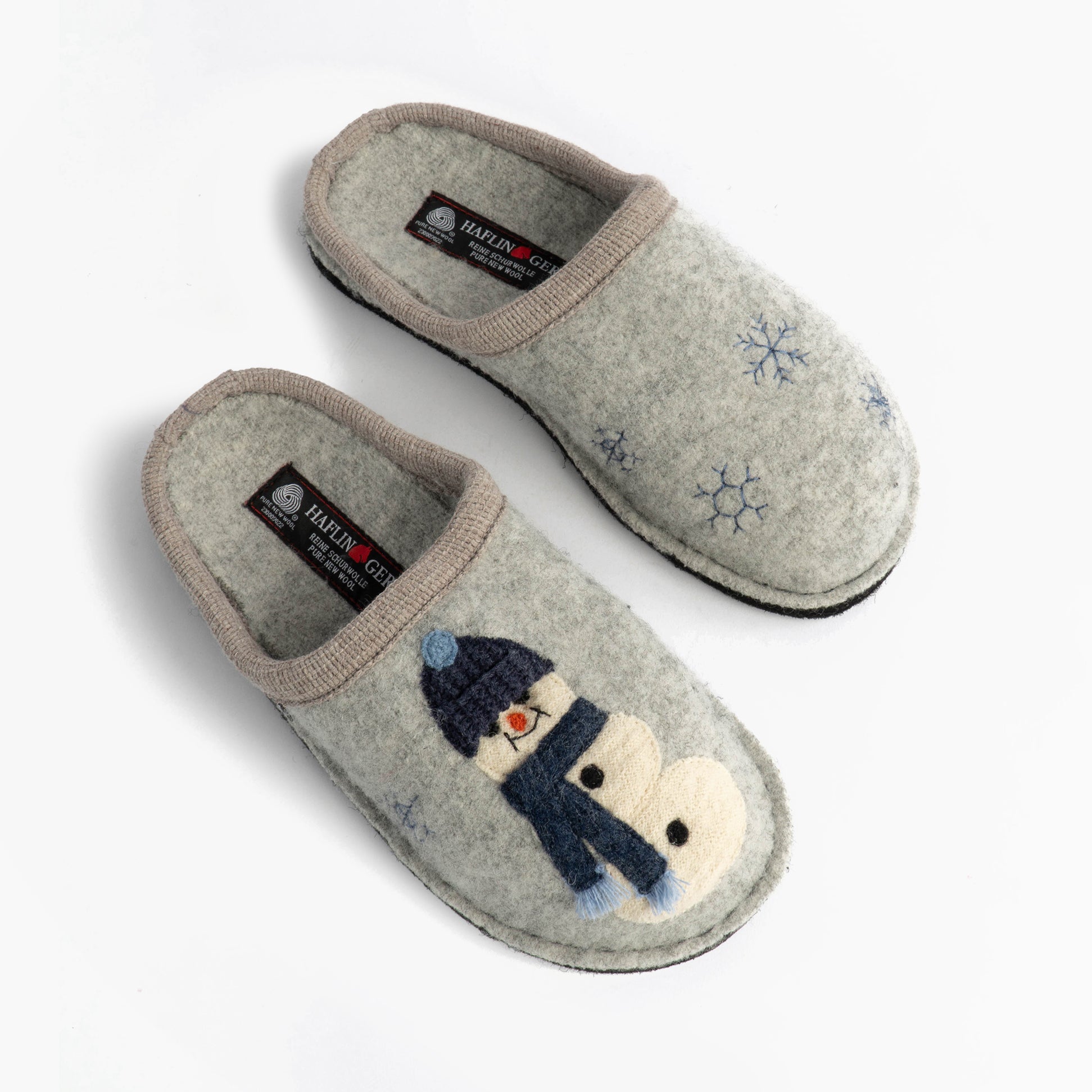 Haflinger OLAF Womens Snowman Mule Slippers Light Grey top view showcasing wool upper and snowman design.