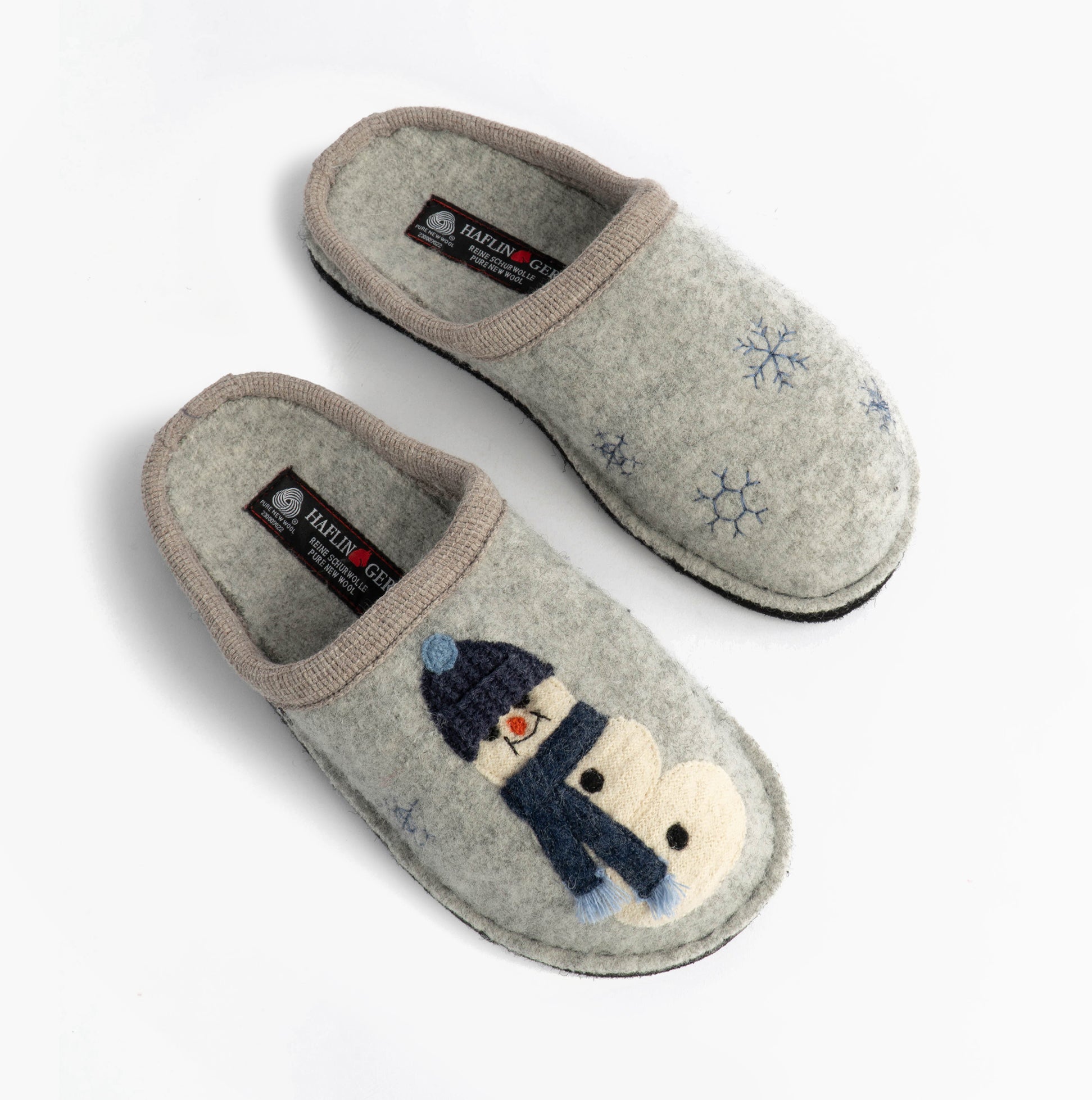 Haflinger OLAF Womens Snowman Mule Slippers Light Grey top view showcasing wool upper and snowman design.