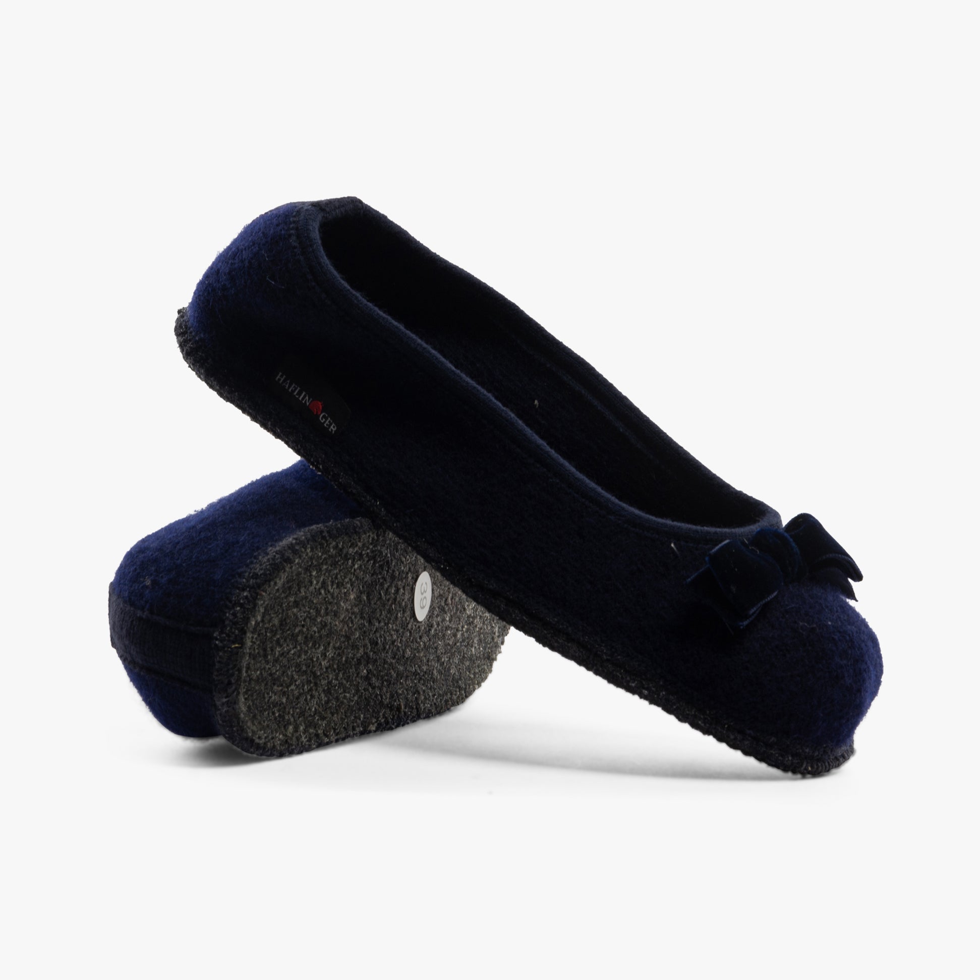 Haflinger FIOCCO Womens Slippers Navy side view showing round toe and slip-on design with textured sole.