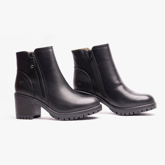 Heavenly Feet LARKIN Womens Ankle Zip Boots Black side view pair with block heel and zip closure.