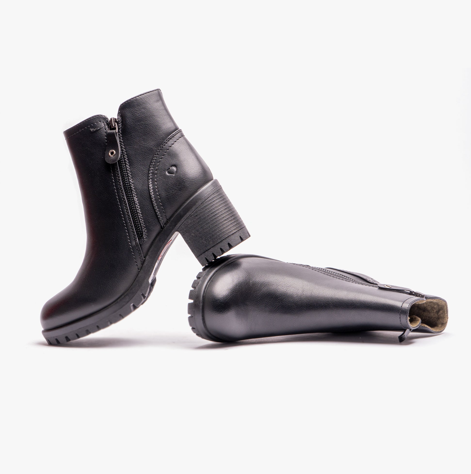 Heavenly Feet LARKIN Womens Ankle Zip Boots Black side view and angled front view showcasing synthetic material and block heel.