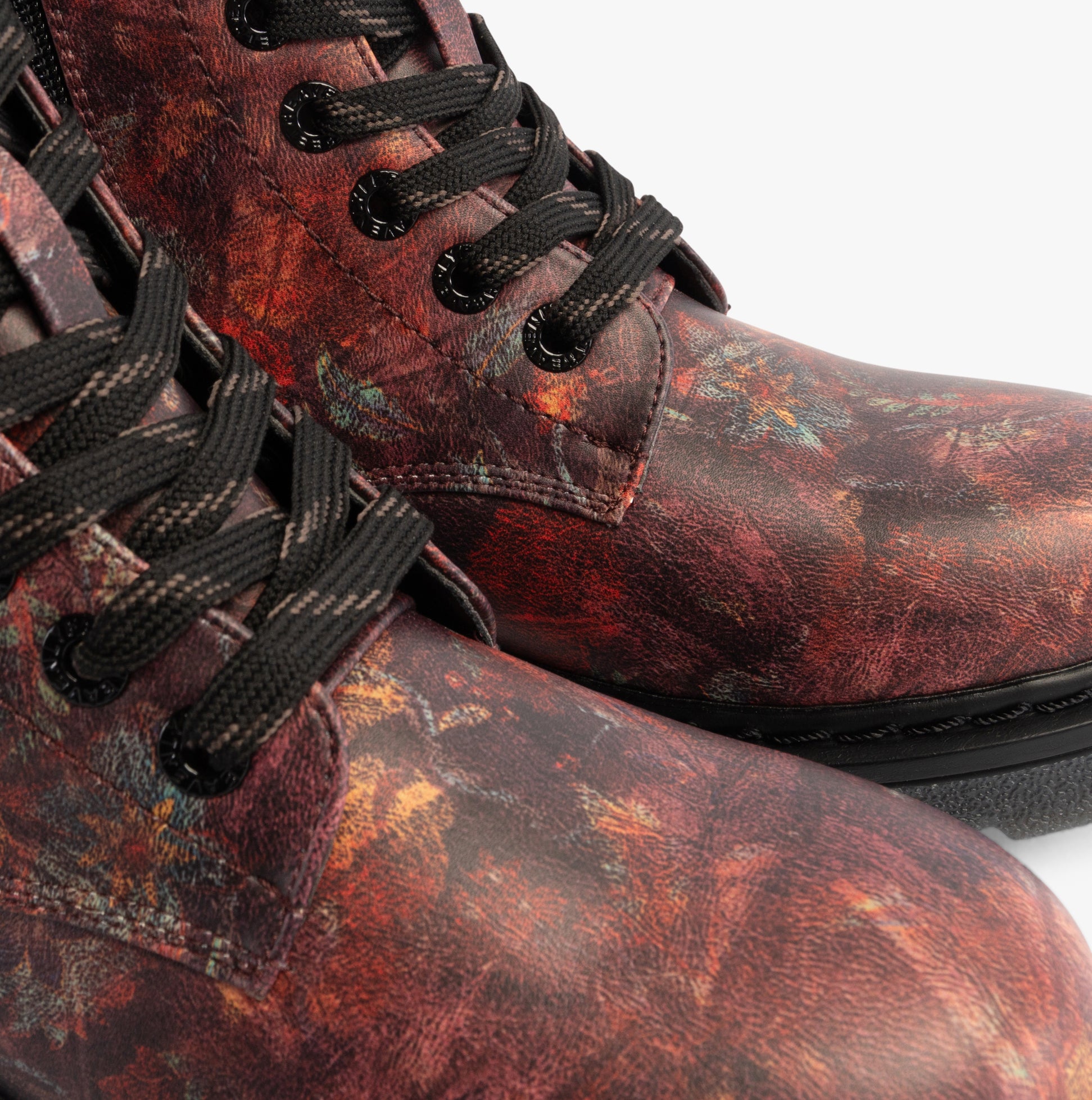 Heavenly Feet JUSTINA2 WOODLAND PRINT Womens Lace Up Boots Bark detail view showing faux leather texture and laces.