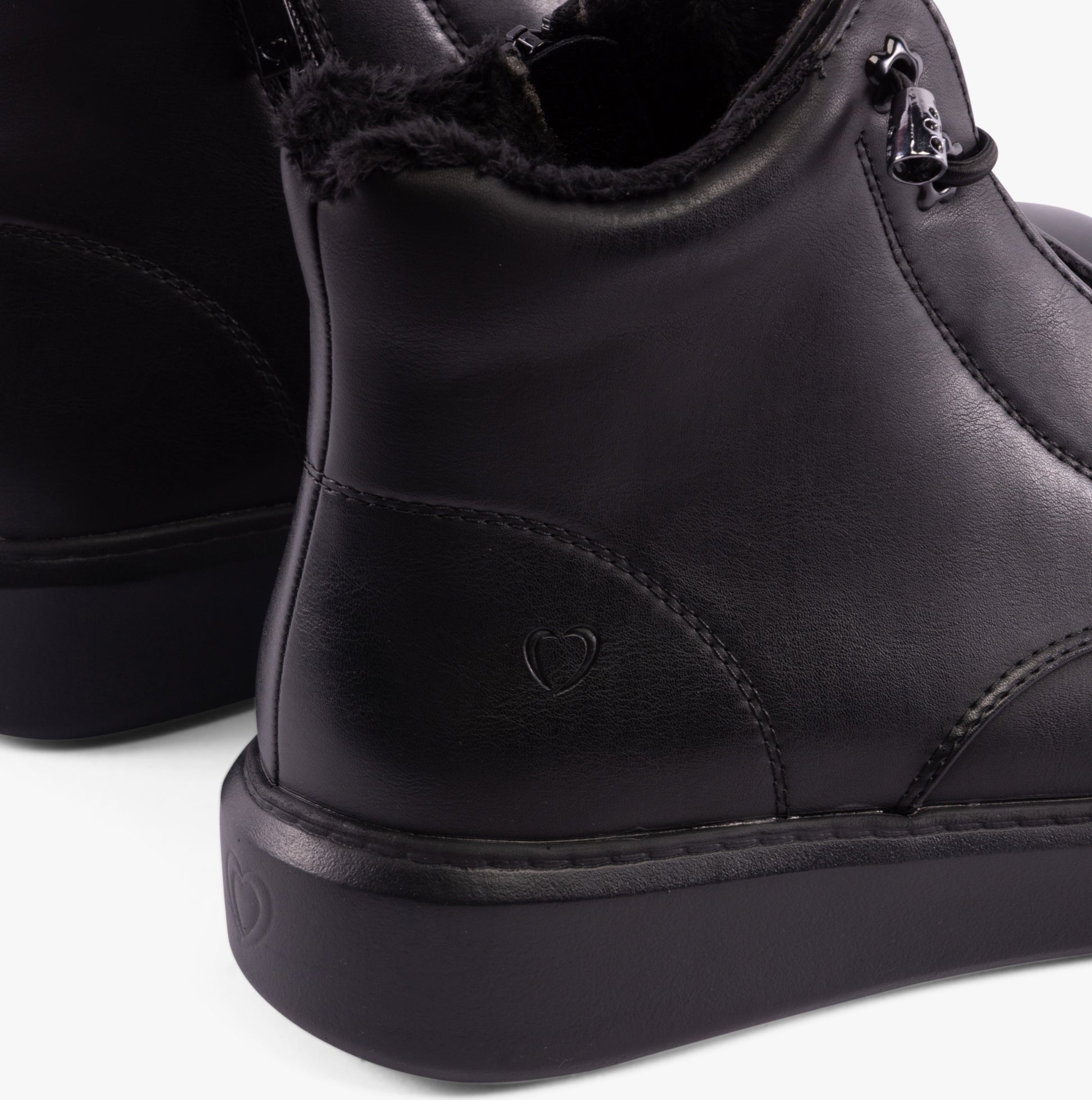 Heavenly Feet PETRA Womens Boots Black, detail view of ankle boot with faux leather upper and rubber sole.