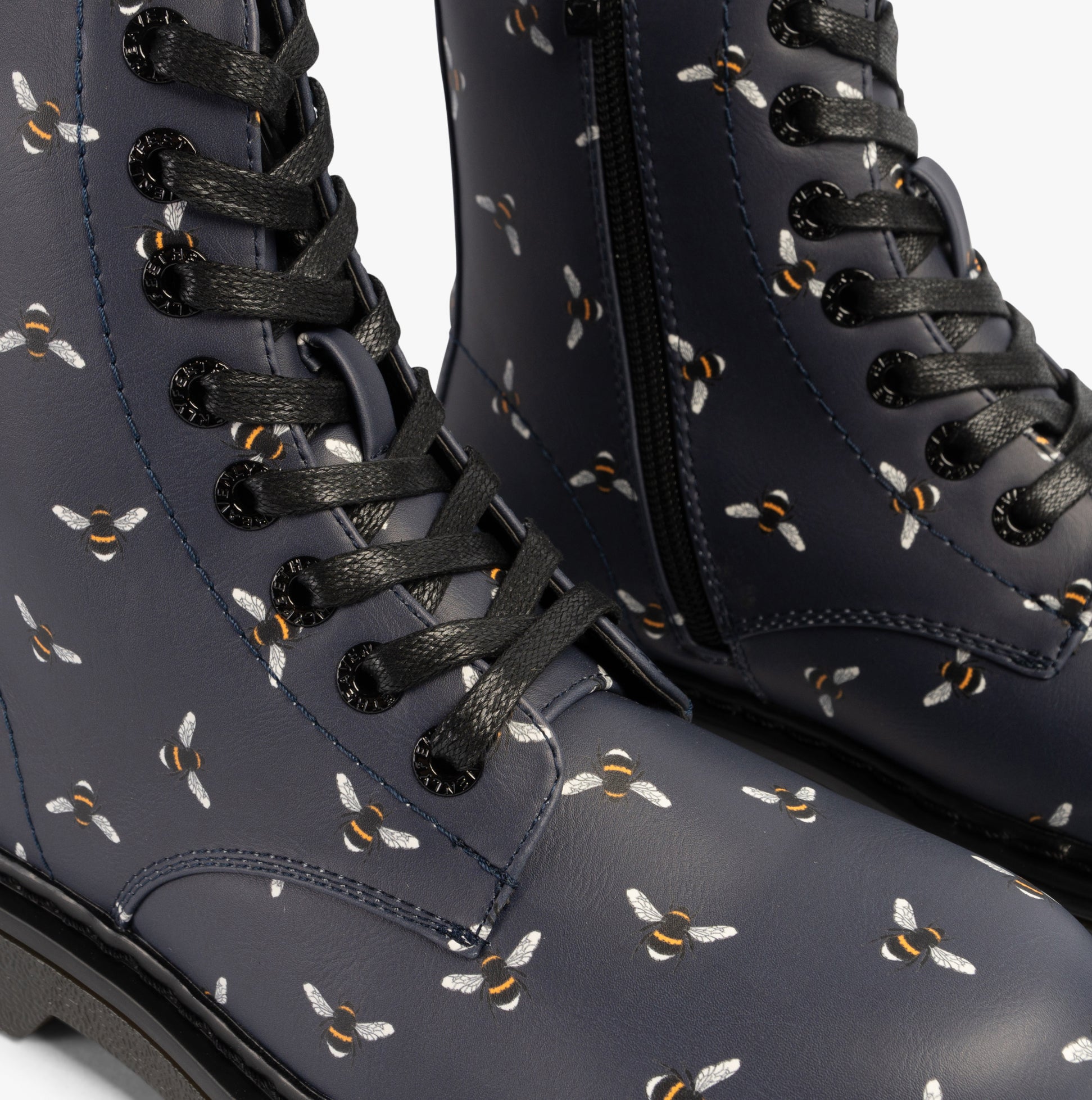 Heavenly Feet JUSTINA2 NEW BEE PRINT Womens Lace Up Boots Midnight close-up view showing bee print details and laces.