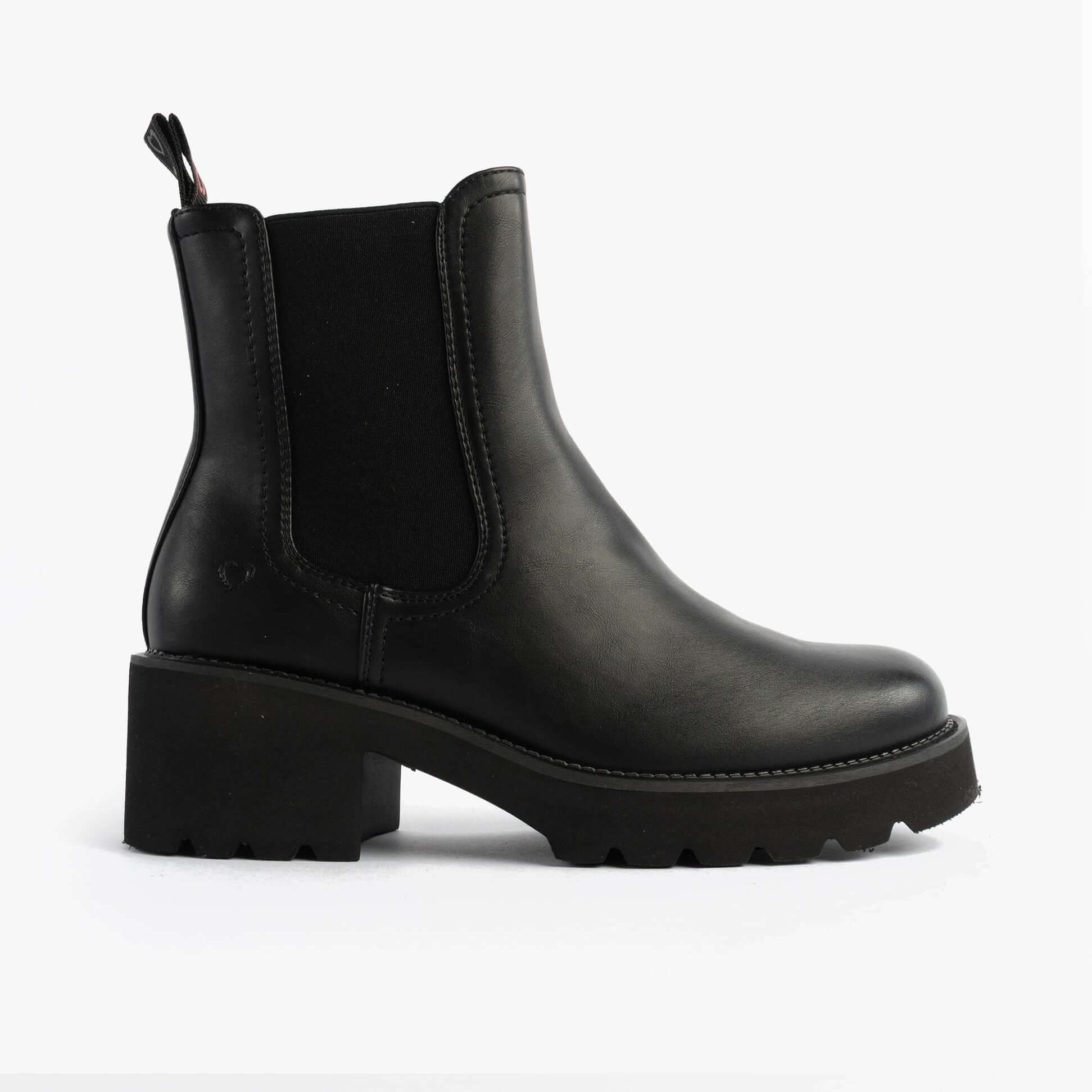 Heavenly Feet HONEYBELLE Womens Chelsea Boots Black side view with thick sole.