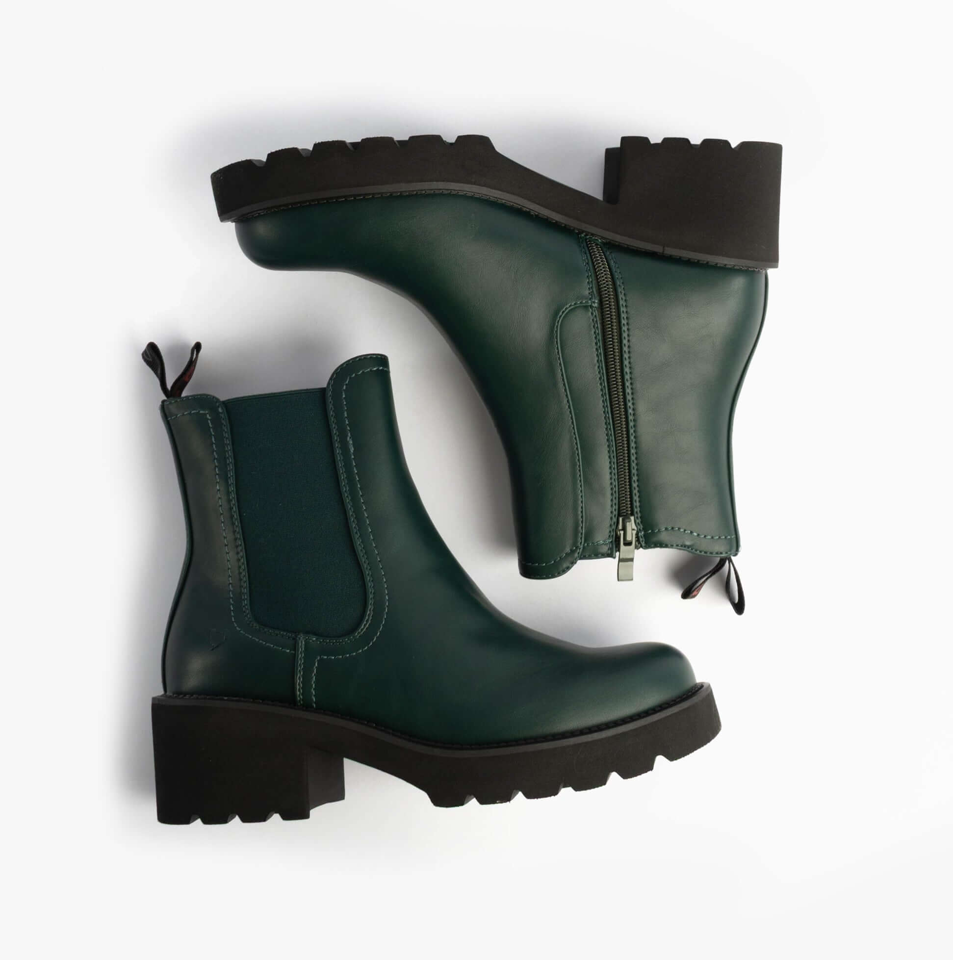 Heavenly Feet HONEYBELLE Womens Chelsea Boots evergreen side view showing the green faux leather upper and chunky sole.