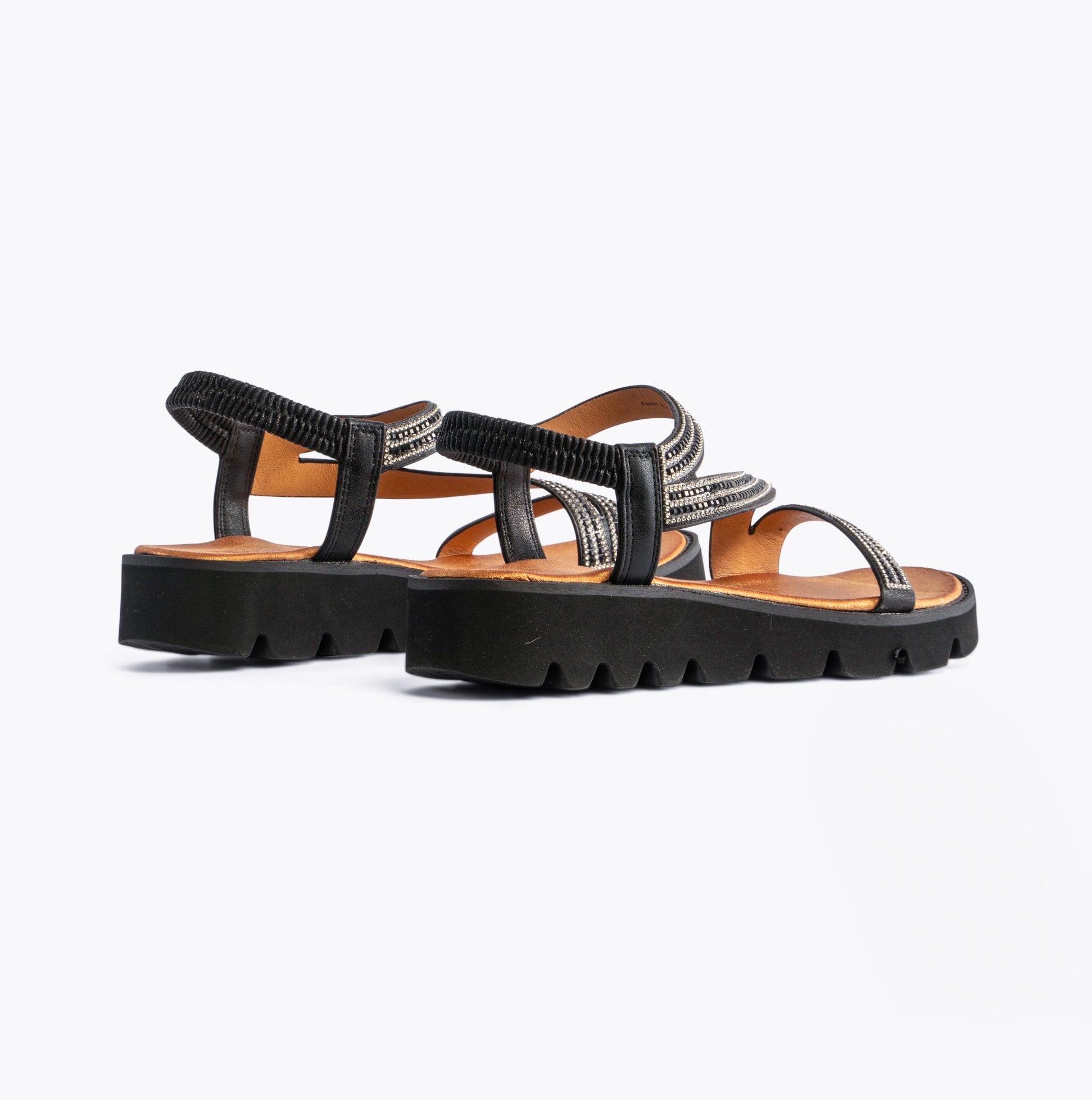 Heavenly Feet FRESCO Womens Sandals Black side view showcasing the stylish slip-on design and wedge heel.
