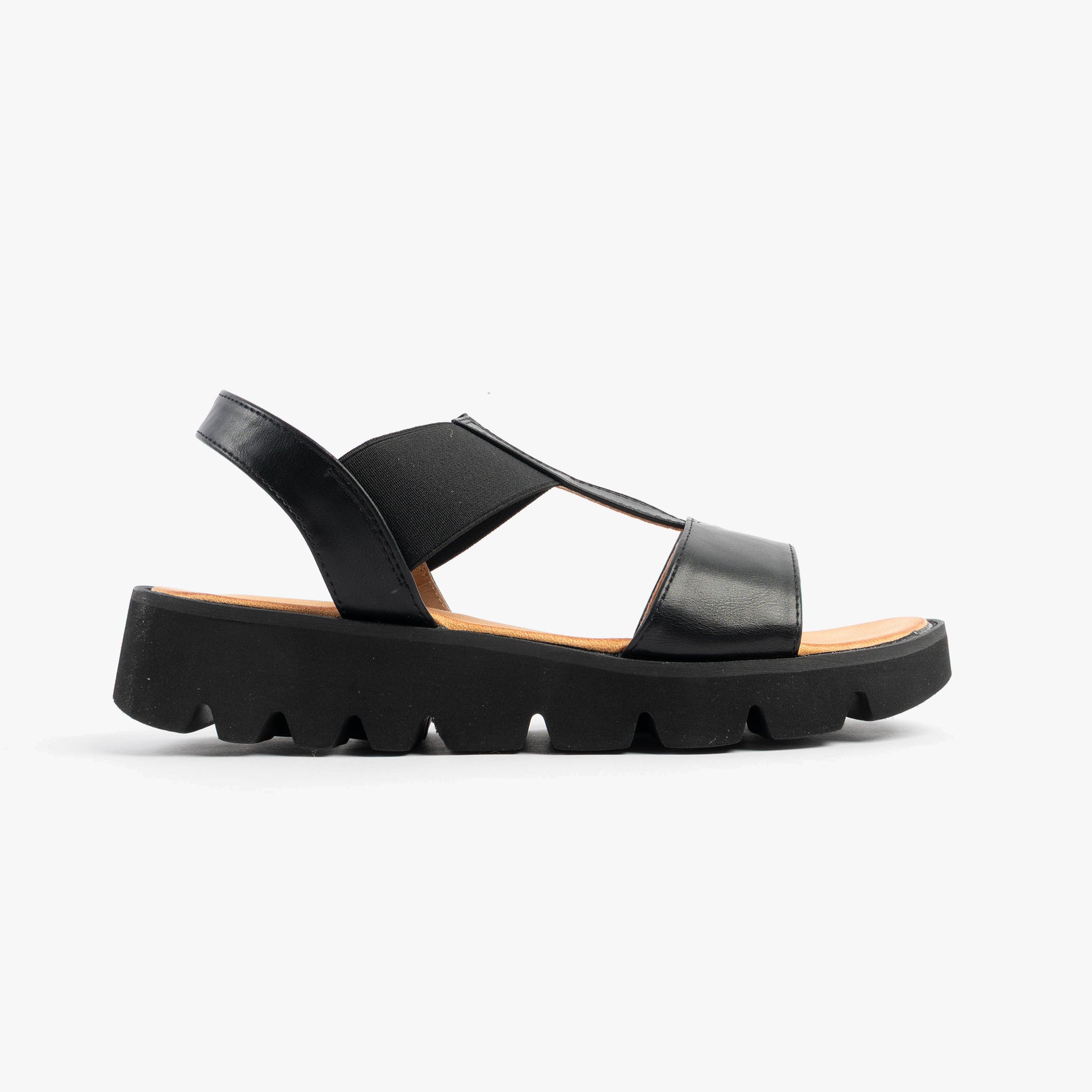 Heavenly Feet RITZ Womens Sandals Black side view showing synthetic upper and wedge rubber sole.