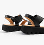 Heavenly Feet RITZ Womens Sandals Black side view showcasing the slip-on design and wedge heel.