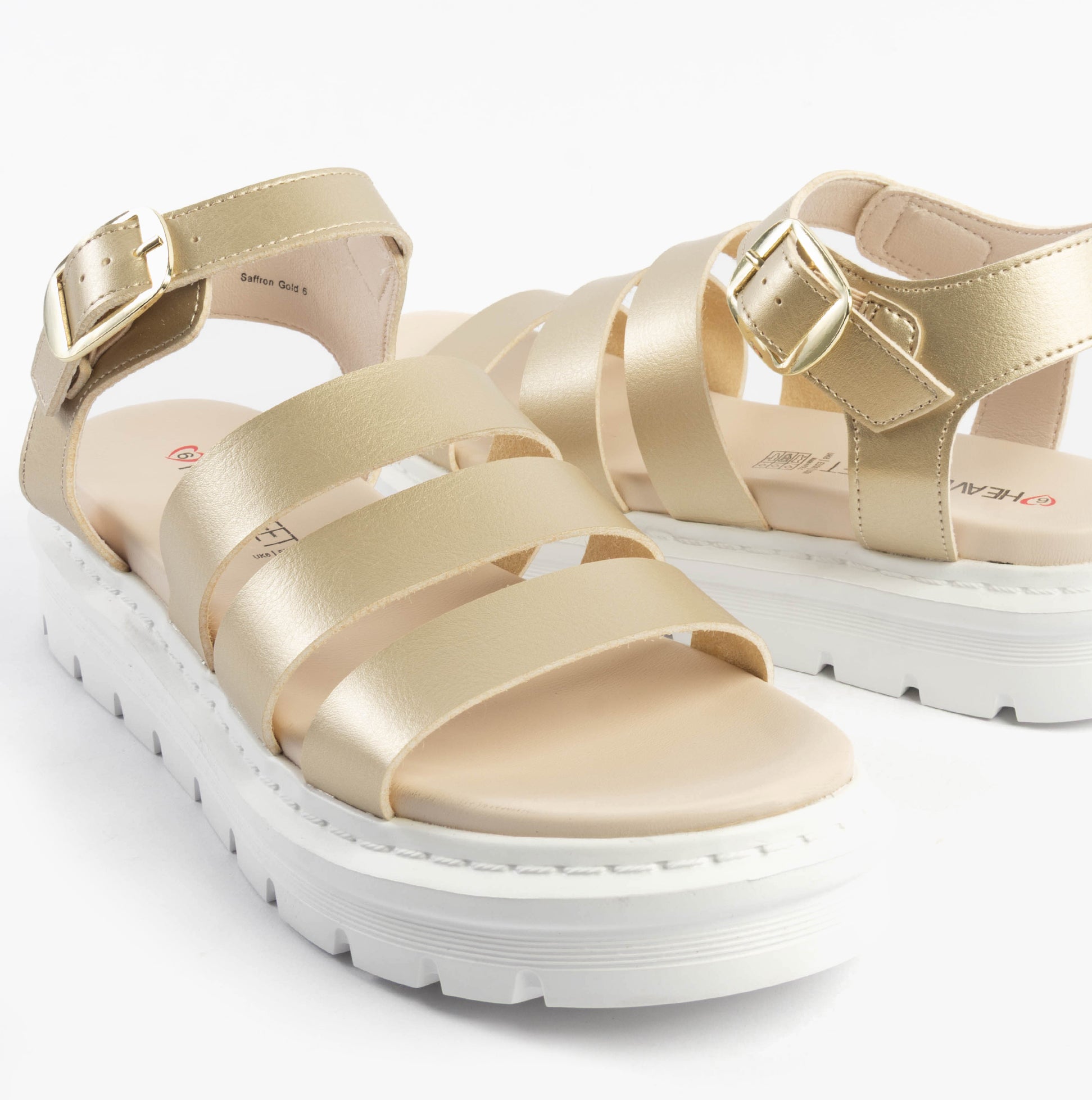 Heavenly Feet SAFFRON Womens Sandals Gold side view showcasing synthetic leather straps and comfortable EVA sole.