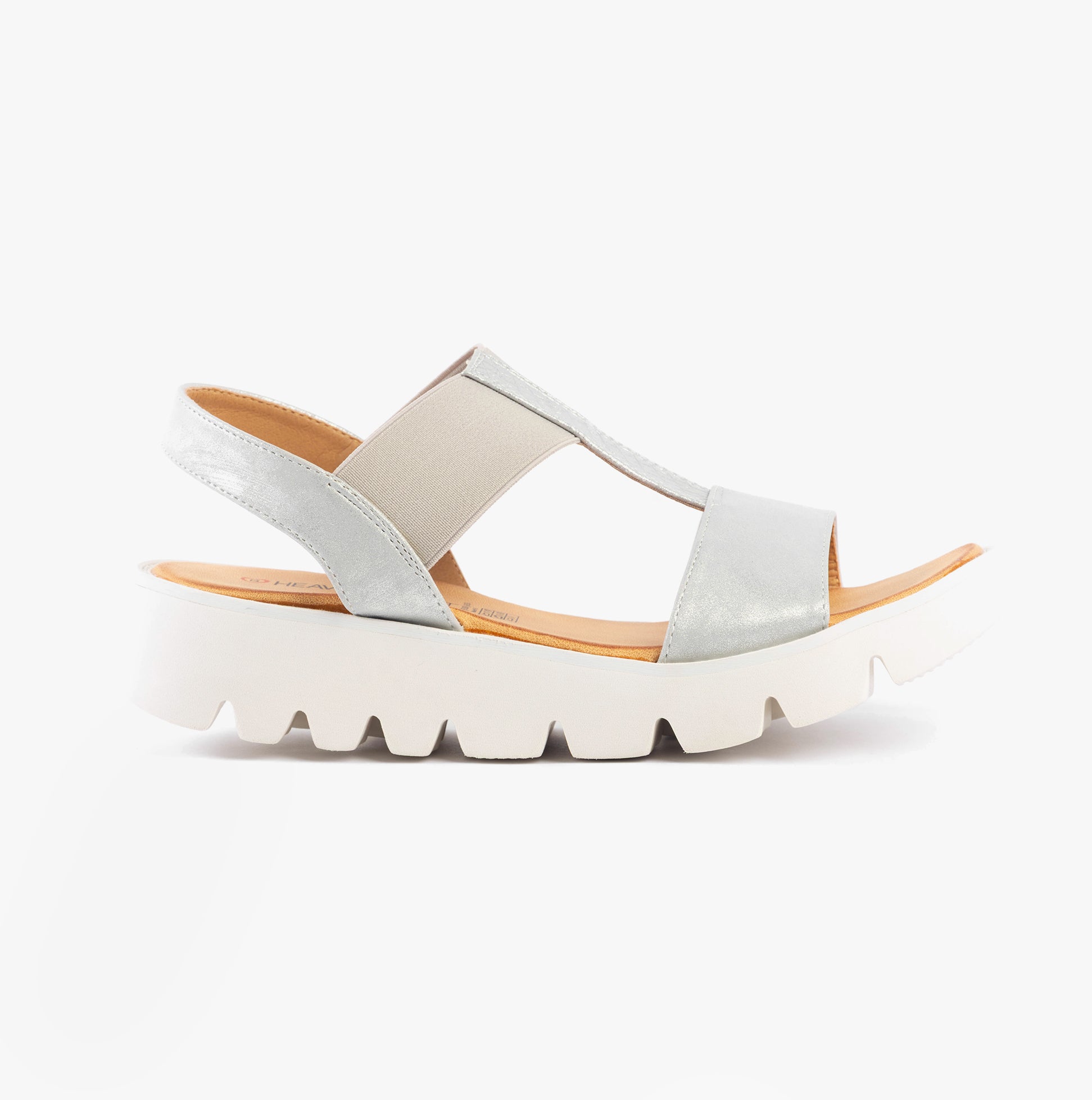 Heavenly Feet RITZ SHIMMER Womens Sandals Silver Shimmer side view showcasing faux leather and wedge heel.