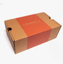 Heavenly Feet SALTWATER Womens Slingback Sandals Black packaging view in a brown box with logo.