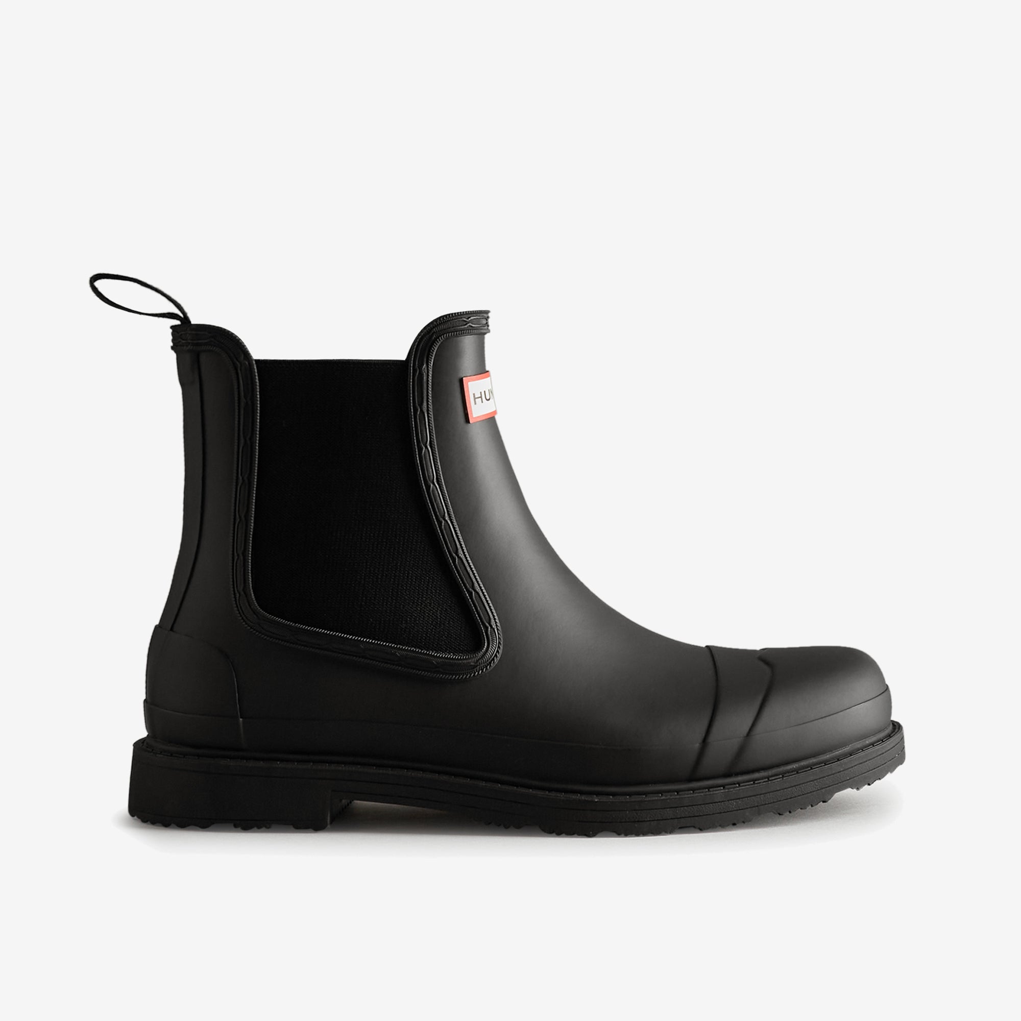 Hunter COMMANDO CHELSEA Mens Wellies Black side view of ankle-height waterproof rubber boots