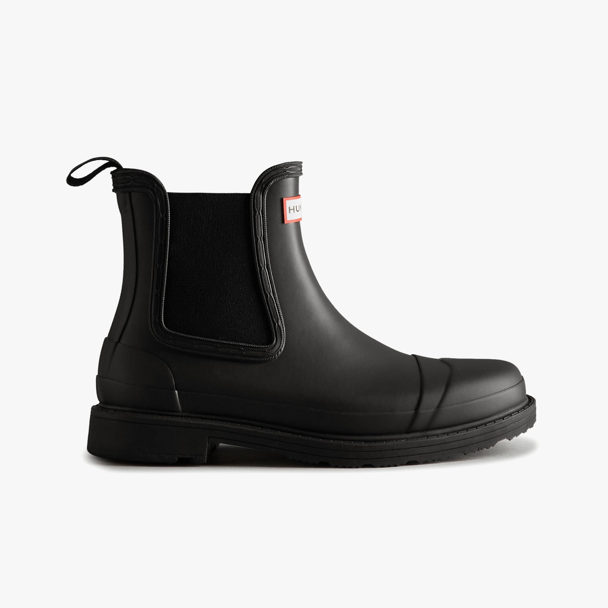 Hunter CHELSEA COMMANDO Womens Wellies Black side view of ankle boot with pull-on design