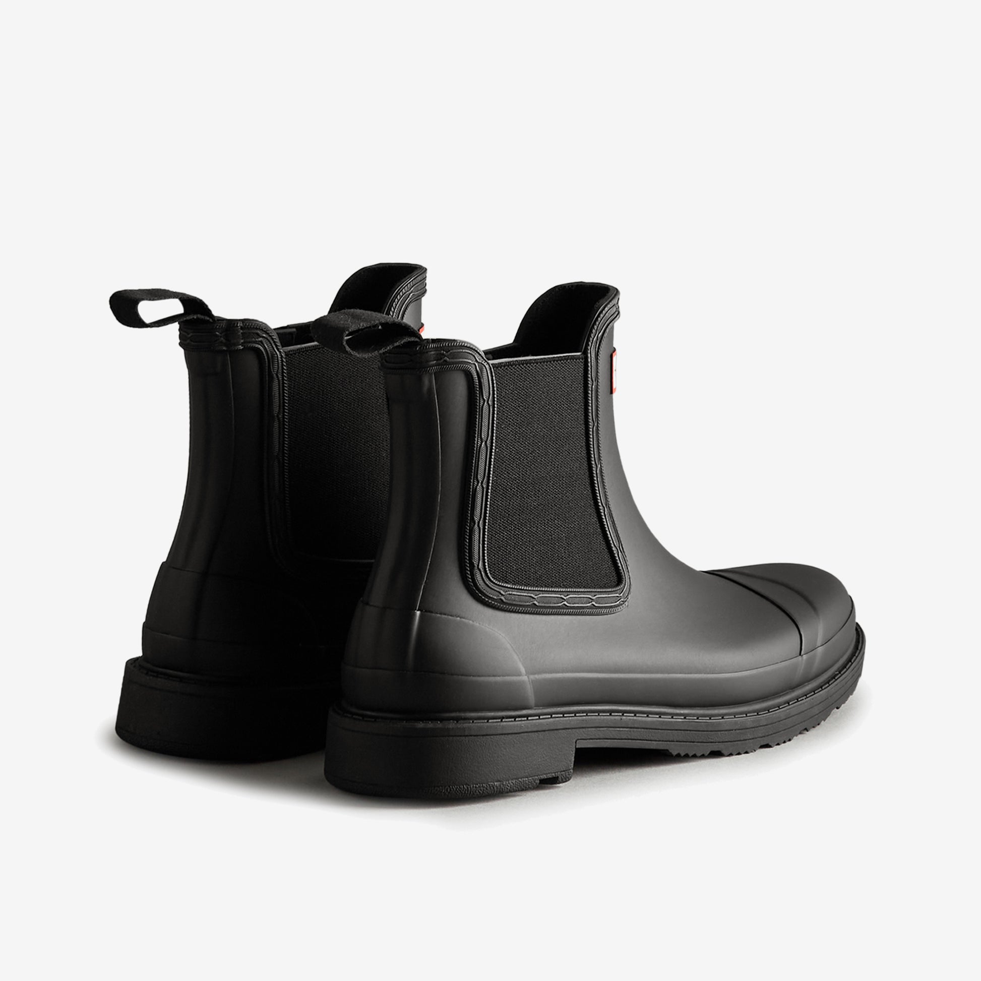Hunter CHELSEA COMMANDO Womens Wellies Black rear view showcasing the stylish waterproof pull-on boot design.