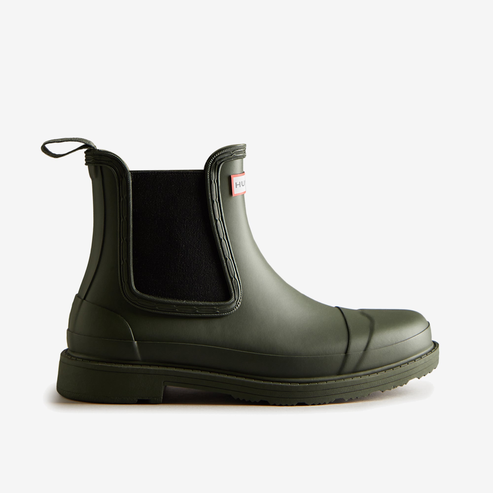 Hunter CHELSEA COMMANDO Womens Wellies Dark Olive side view showing rubber upper and pull-on design.