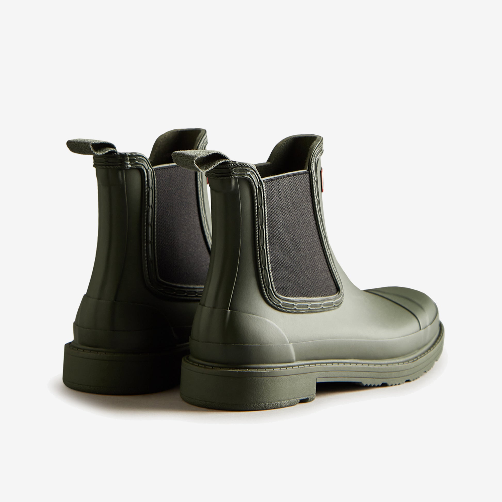 Hunter CHELSEA COMMANDO Womens Wellies Dark Olive back view showing rubber upper and pull-on design.
