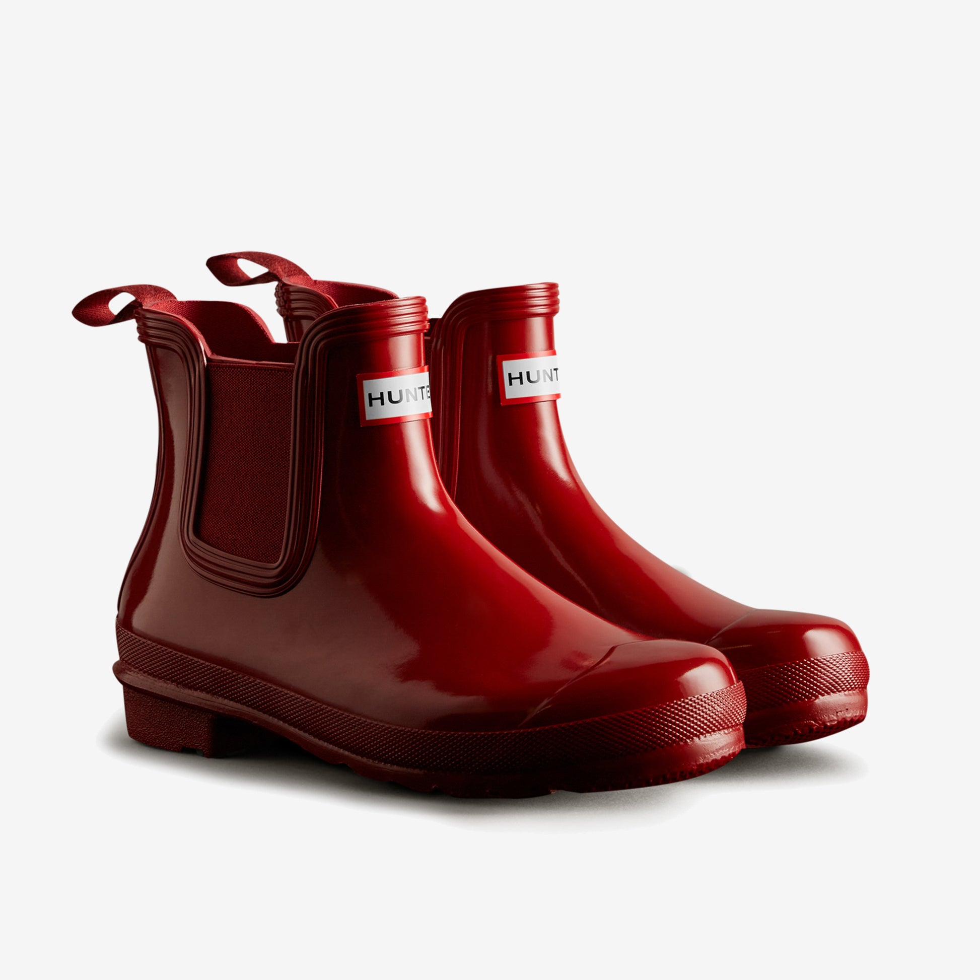 Hunter ORIGINAL CHELSEA Womens Wellies Military Red Gloss side view showcasing shiny rubber finish and pull-on design.