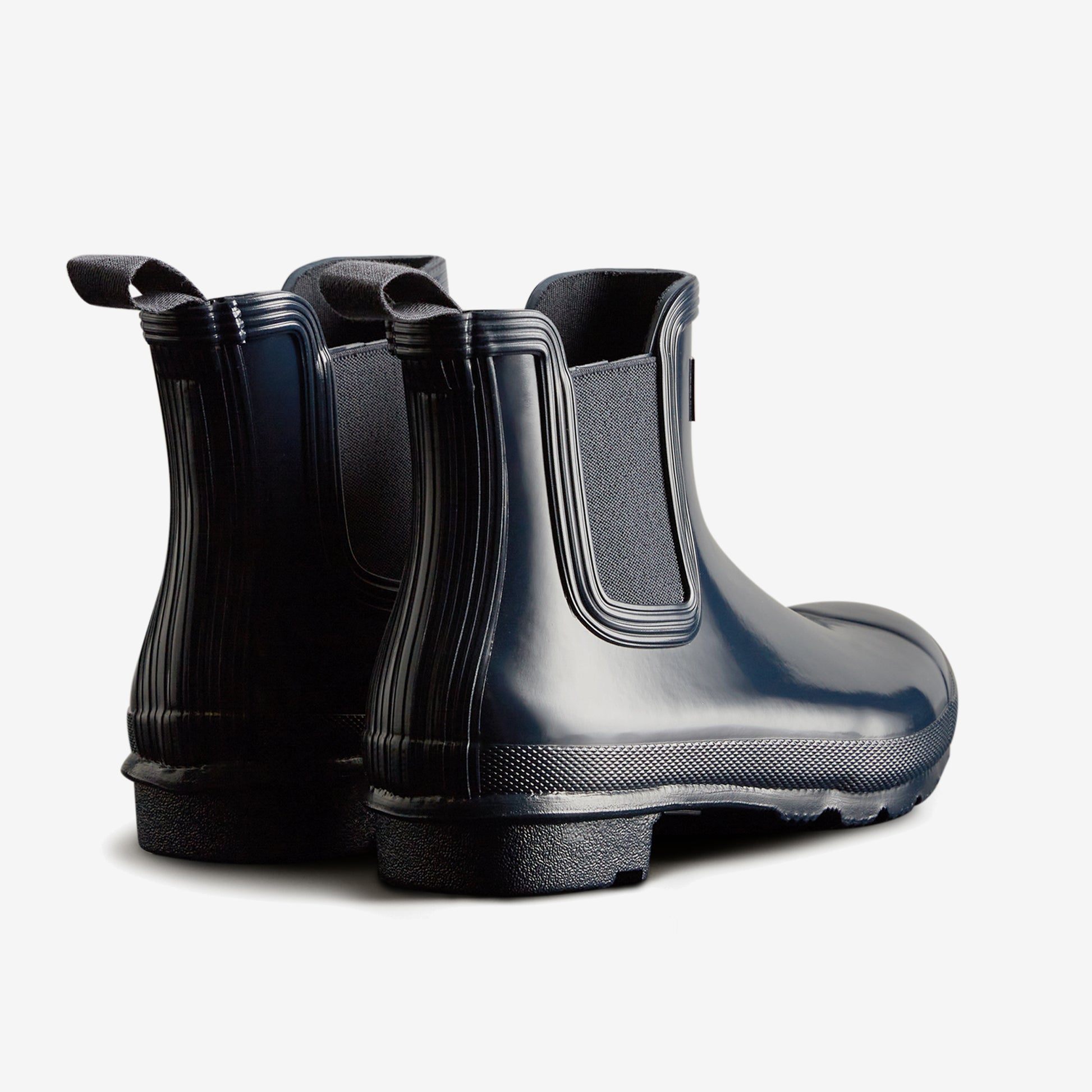 Hunter ORIGINAL CHELSEA Womens Wellies Navy Gloss back view with ankle height and pull-on design, showcasing the glossy rubber finish.