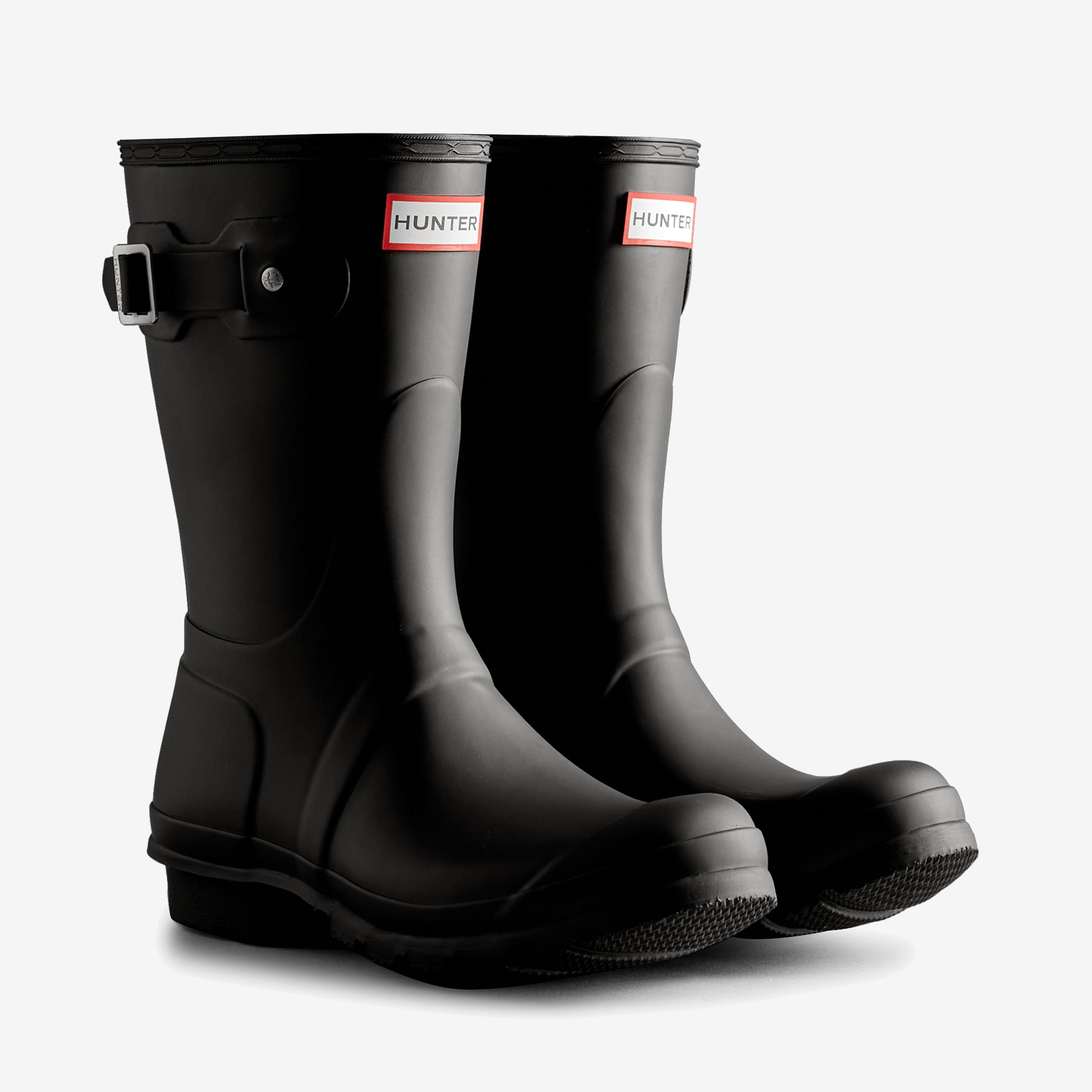 Hunter ORIGINAL SHORT TRI COLOUR LOGO BOOT Womens Wellies Black side view showing rubber material and pull-on design