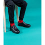 Hush Puppies BESPOKE SENIOR Boys Shoes Black side view, showcasing slip-on design and low top profile.