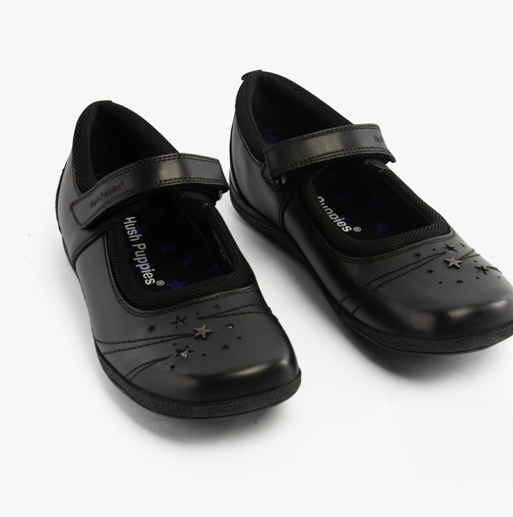 Hush Puppies AMBER JUNIOR Girls Leather School Shoes Black side view showing adjustable strap and star detail.
