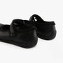 Hush Puppies AMBER JUNIOR Girls Leather School Shoes Black rear view showing adjustable strap and flat sole.