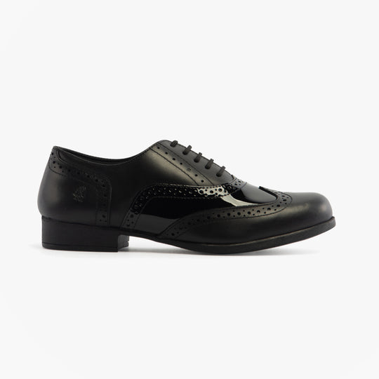 Hush Puppies KADA Girls Leather School Shoes Black side view showcasing patent leather upper, lace-up closure, and round toe.
