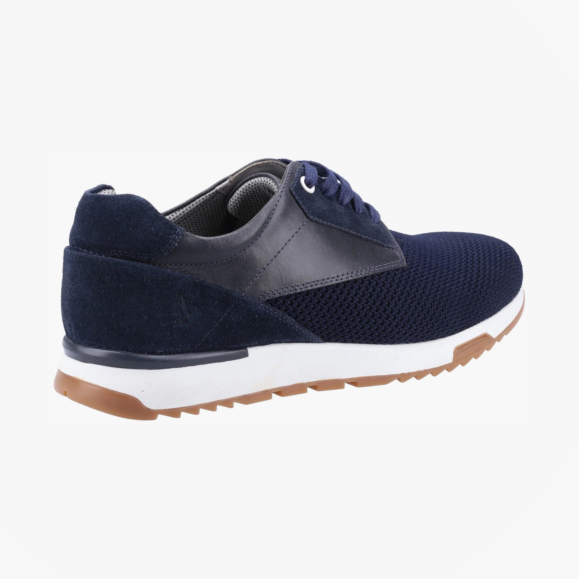 Hush Puppies SIMON Mens Trainers Navy side view showcasing leather and suede materials, lace-up closure, and flat sole design.
