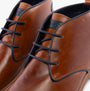 Hush Puppies JONAS CHUKKA Mens Boots Tan detail view of upper leather and lace-up design.