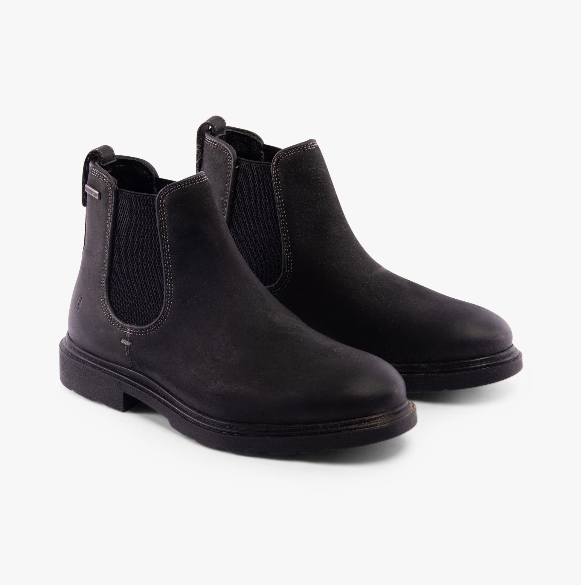 Hush Puppies PRESTON CHELSEA Mens Boots Black side view showing leather upper and block heel design.