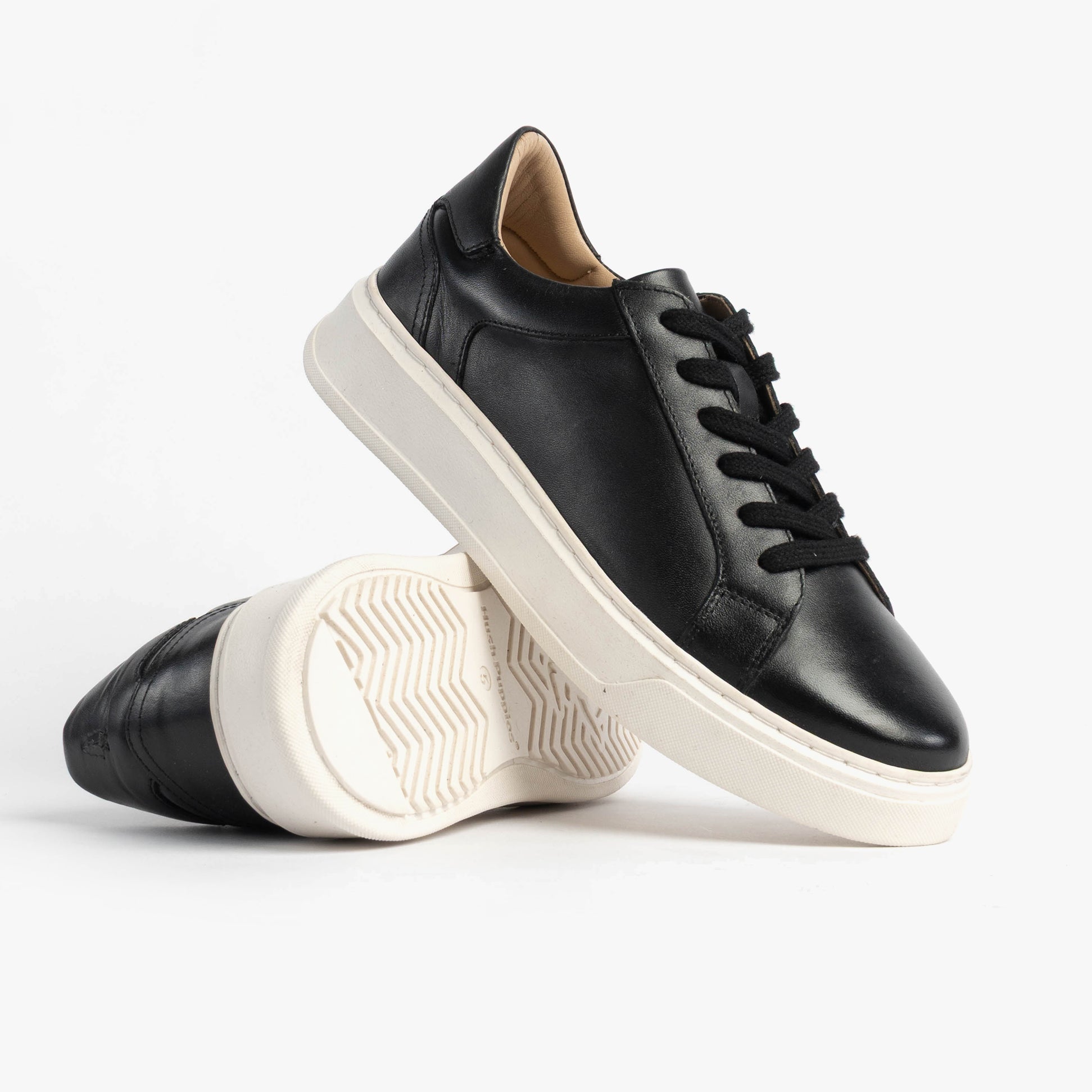 Hush Puppies CAMILLE Womens Trainers Black side view with lace-up closure, casual leather upper, and low-top design.