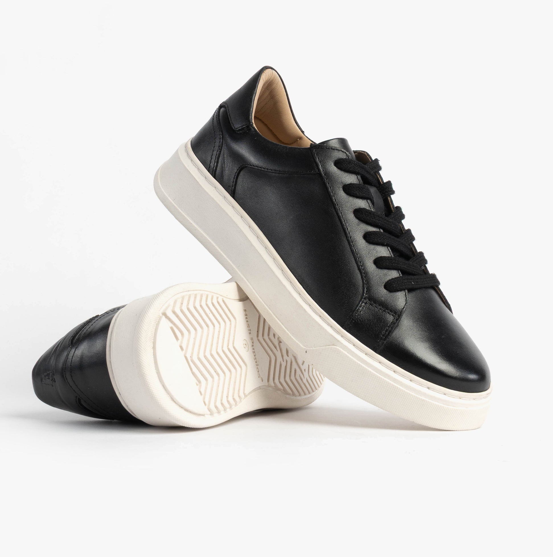Hush Puppies CAMILLE Womens Trainers Black side view with lace-up closure, casual leather upper, and low-top design.