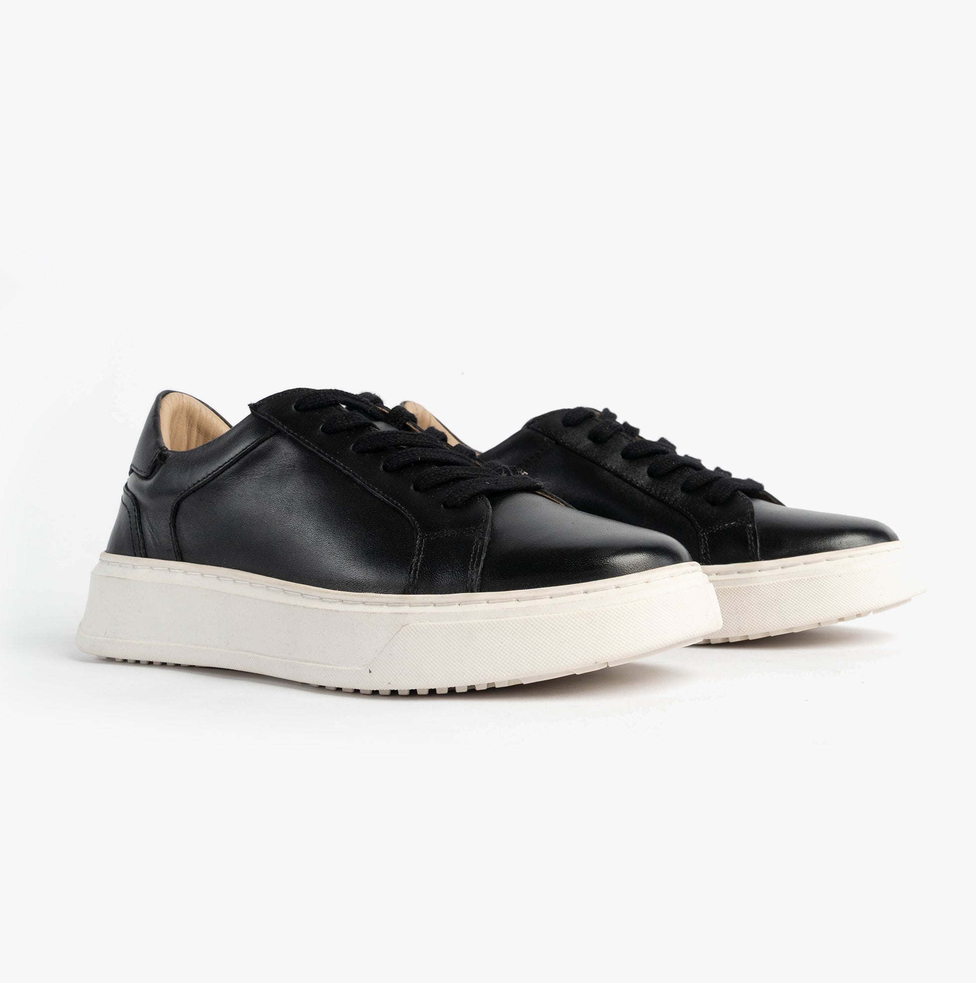 Hush Puppies CAMILLE Womens Trainers Black side view leather casual lace-up shoes with round toe and low top.