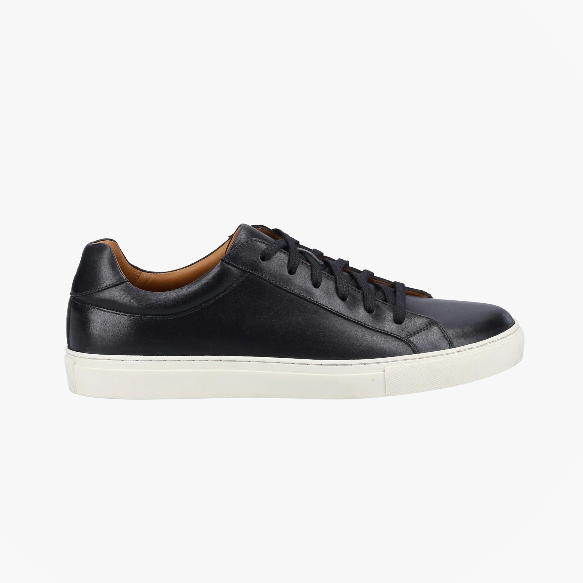 Hush Puppies COLTON Mens Trainers Black side view showing leather upper, lace-up closure, and flat rubber sole.