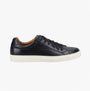 Hush Puppies COLTON Mens Trainers Black side view showing leather upper, lace-up closure, and flat rubber sole.