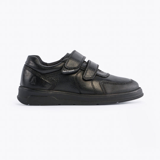 Hush Puppies RYAN Boys Leather School Shoes Black side view showcasing casual design with touch fasten closure.