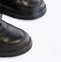 Hush Puppies RYAN Boys Leather School Shoes Black detail view, showcasing the leather upper and round toe design.