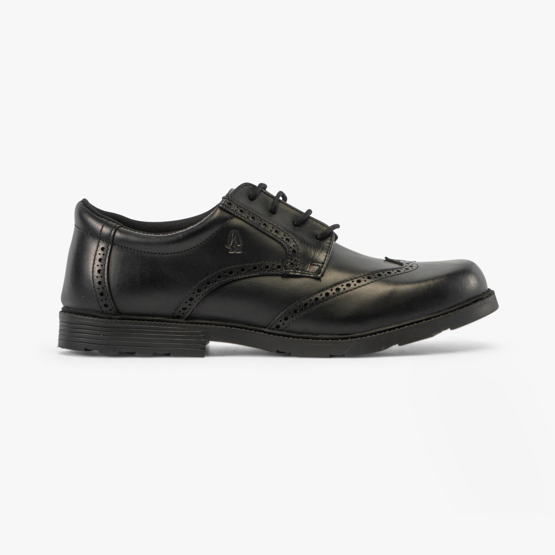 Hush Puppies JACOB SNR Boys Shoes Black side view showcasing leather upper, lace-up design and low top silhouette.