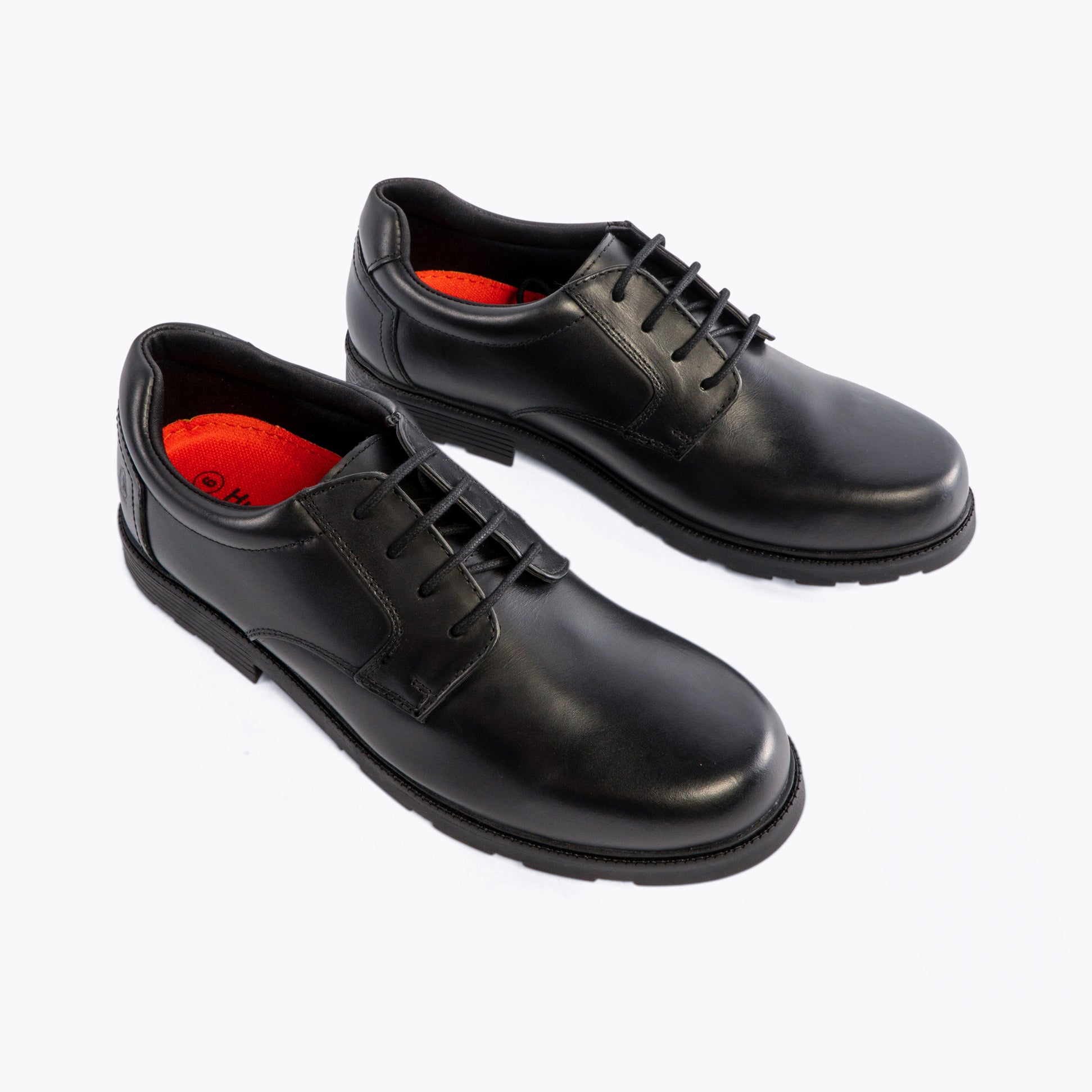 Hush Puppies OLIVER SNR Boys Shoes Black, side view, showcasing the leather upper and lace-up design.