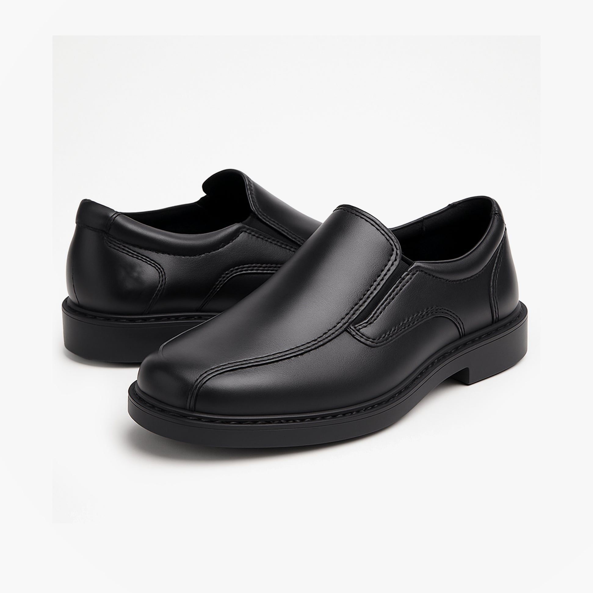 Hush Puppies TOBY SENIOR Boys Shoes Black side view showcasing leather upper and slip-on design.