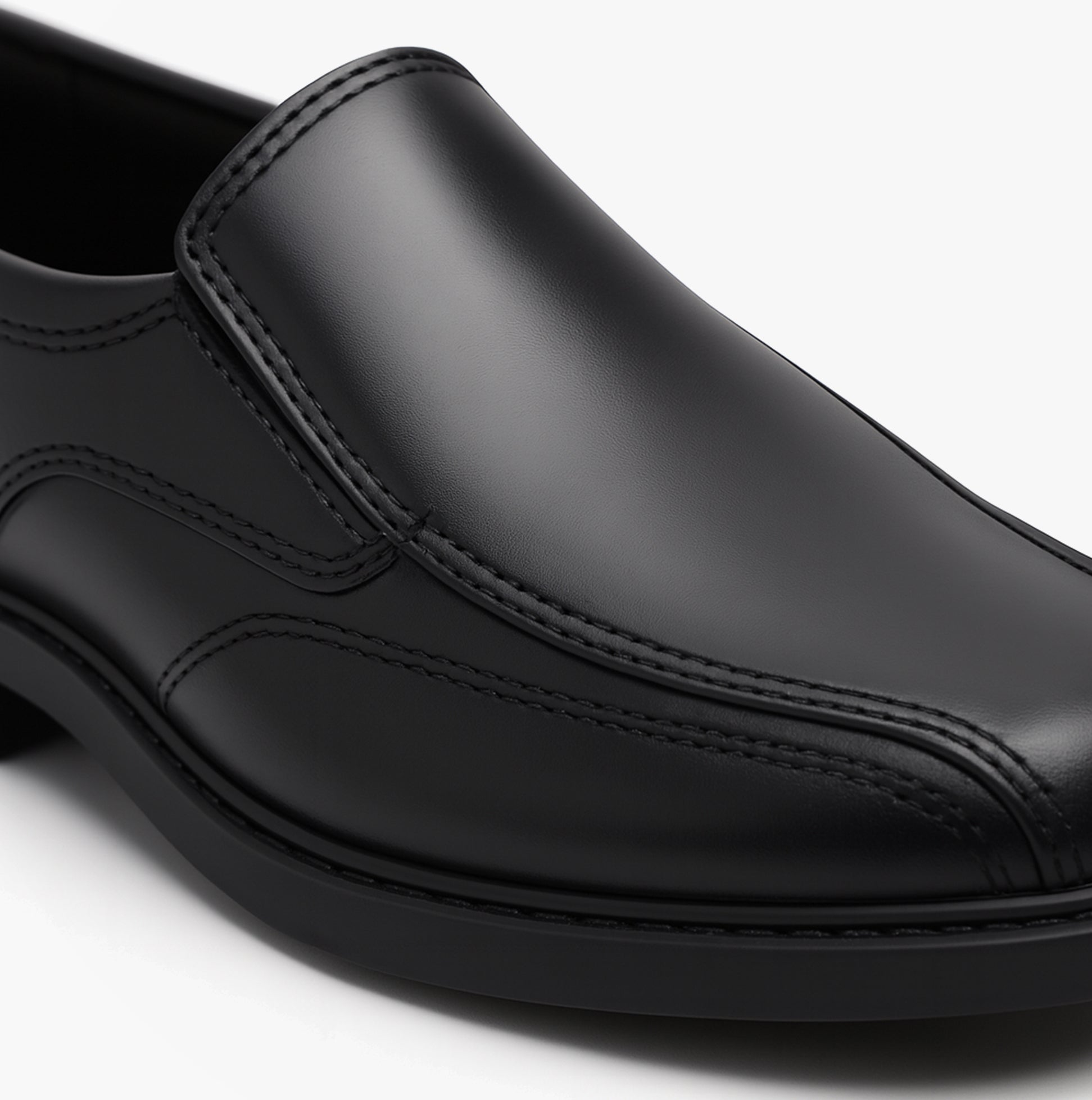 Hush Puppies TOBY SENIOR Boys Shoes Black side view showcasing leather upper and slip-on design.