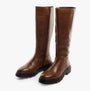 Hush Puppies ROWAN Womens Boots Brown side view showcasing tall leather design and zip closure.