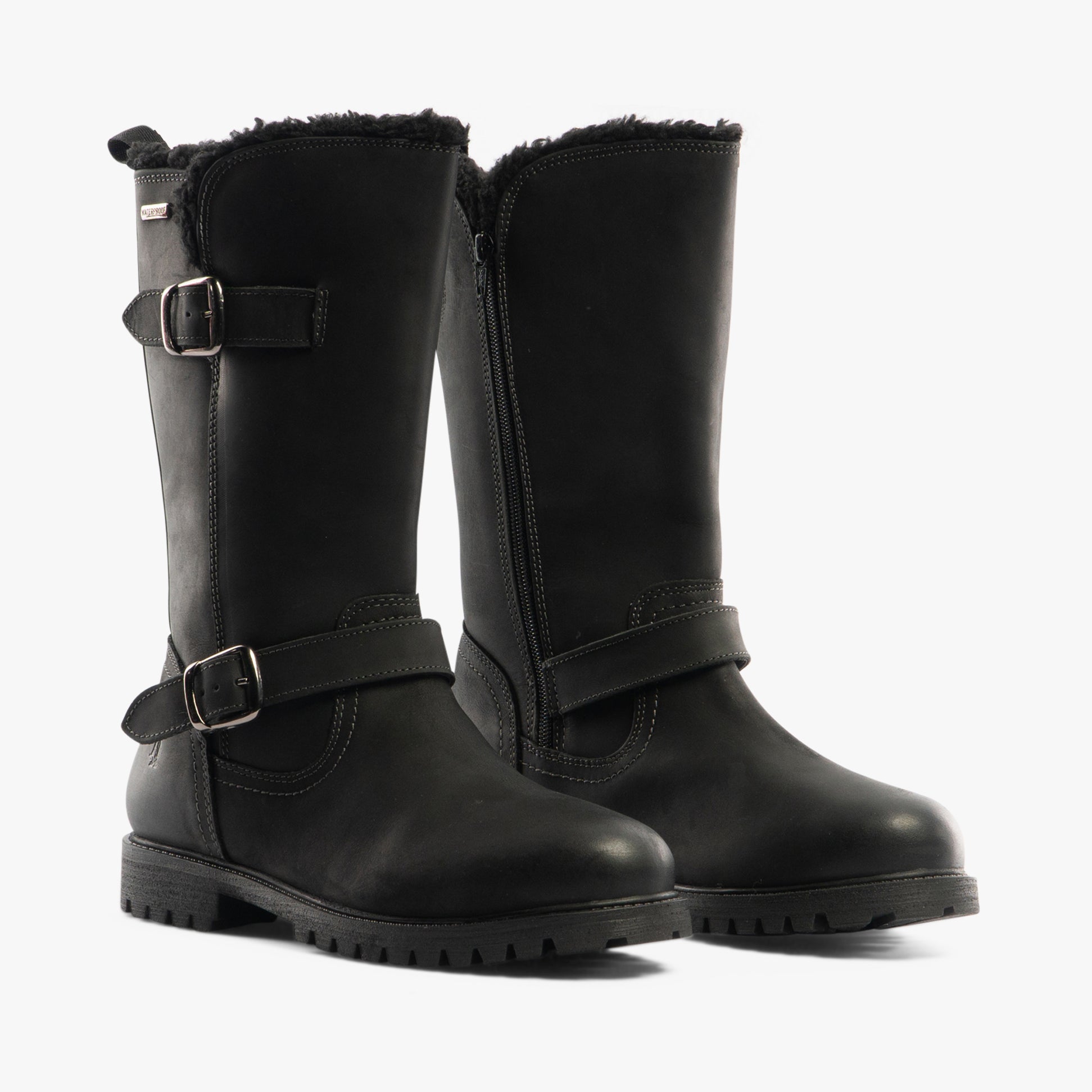 Hush Puppies WINNIE Womens Boots Black side view with buckles and fur lining, showing tall leather design and block heel.