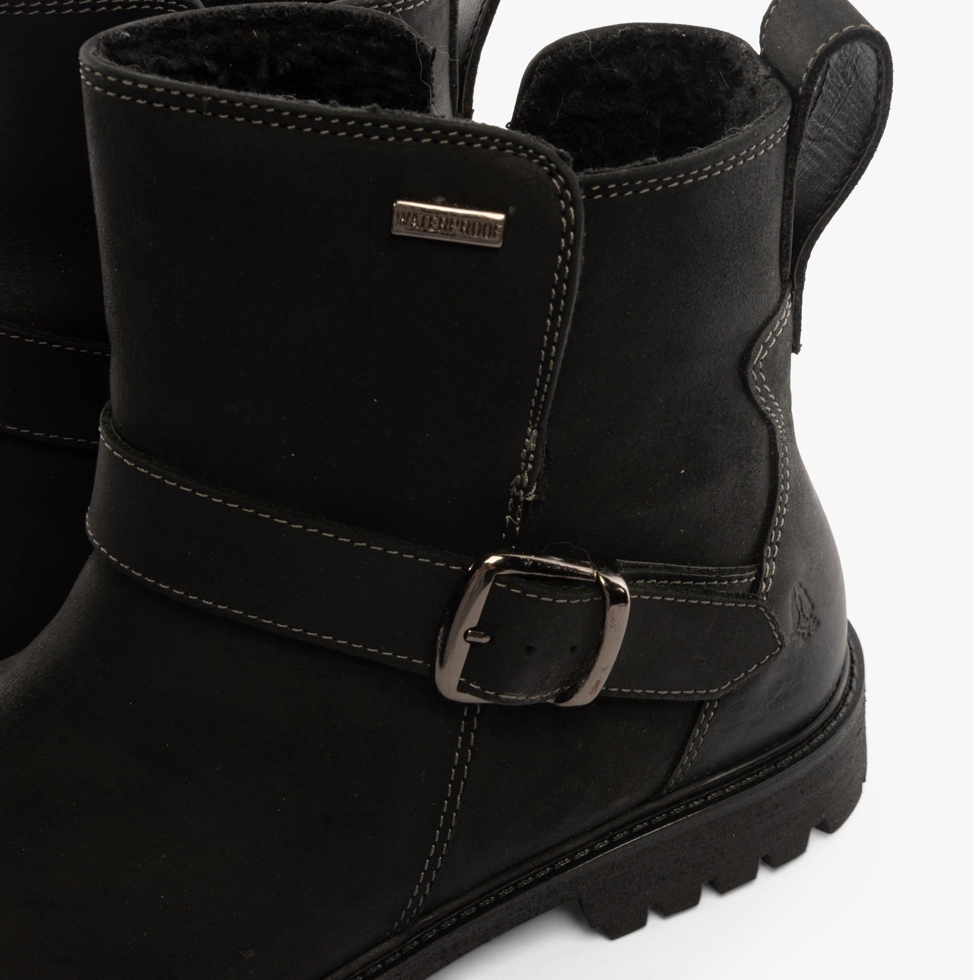 Hush Puppies WAKELY Womens Boots Black detail view featuring leather upper, buckle strap, and cozy lining.