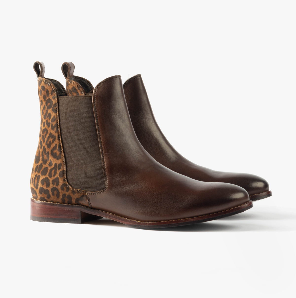 Hush Puppies COLETTE Womens Boots Leopard side view showcasing leather upper and leopard print detail on Chelsea style.