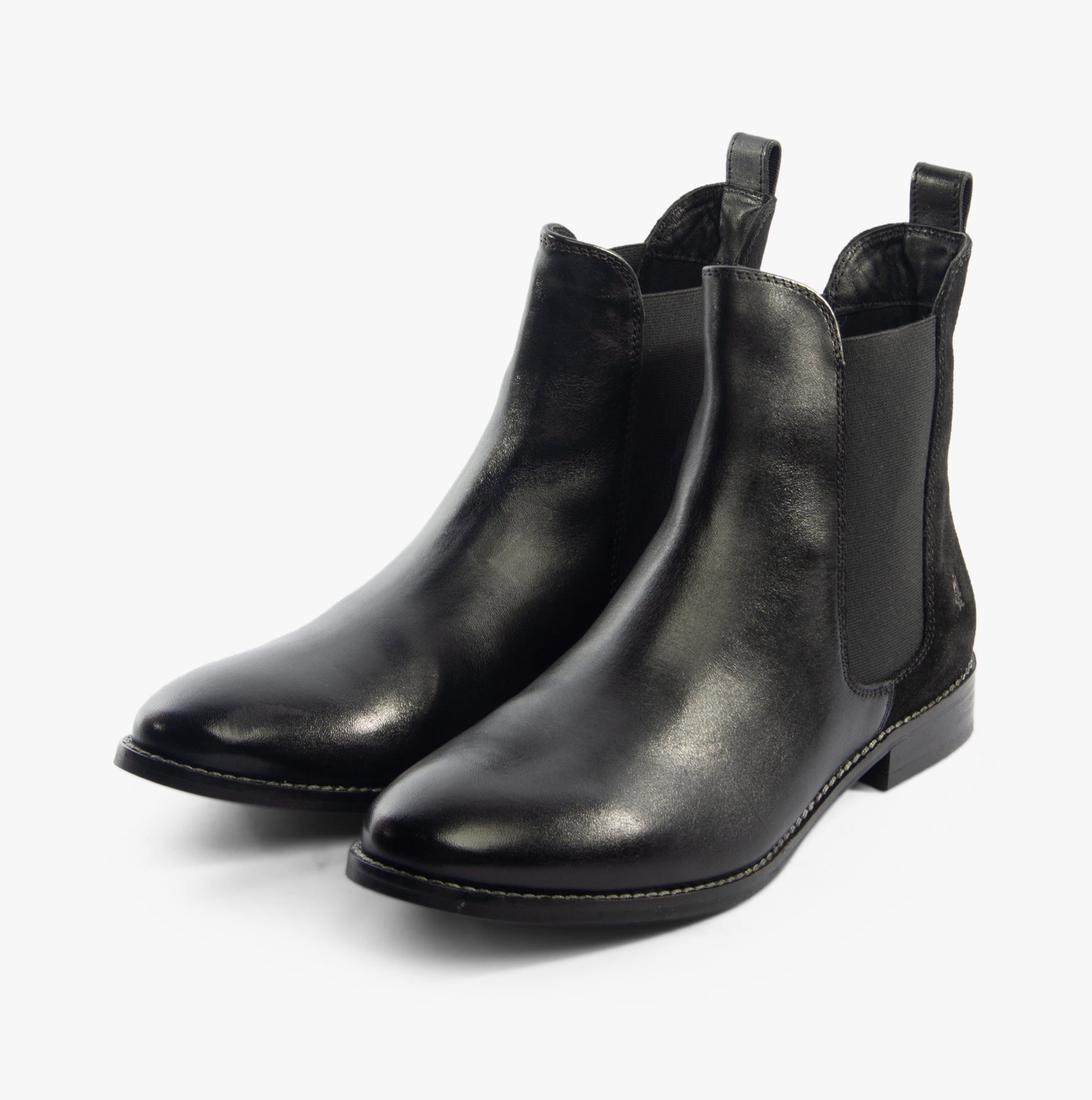 Hush Puppies COLETTE Womens Boots Black side view showcasing sleek leather upper and classic Chelsea boot style.