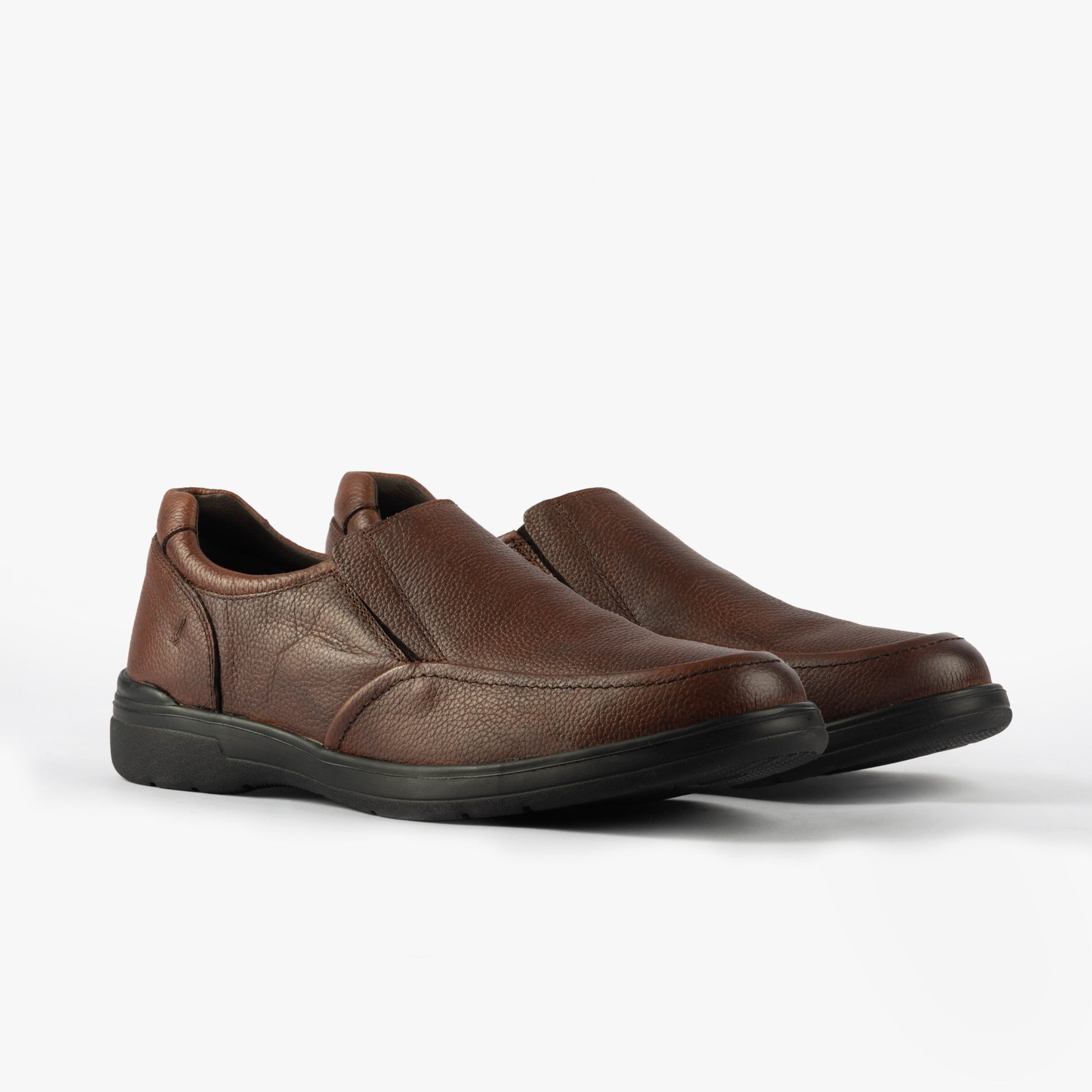 Hush Puppies MATTHEW Mens Shoes Brown side view showing comfortable leather slip-on design.