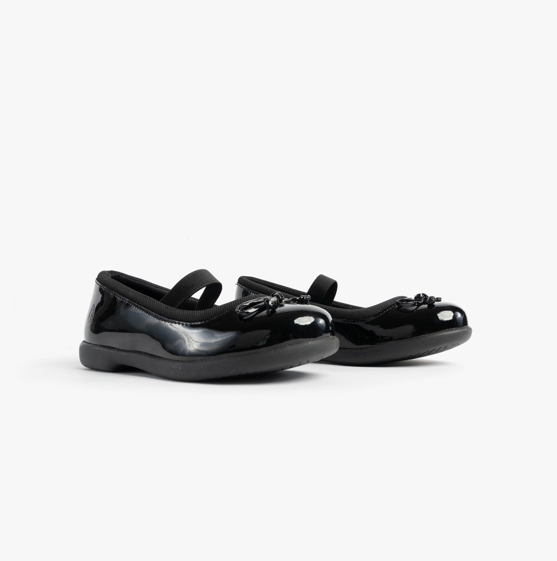 Hush Puppies BETTY PATENT JNR Girls Shoes Black side view showing the glossy patent leather finish and slip-on design.